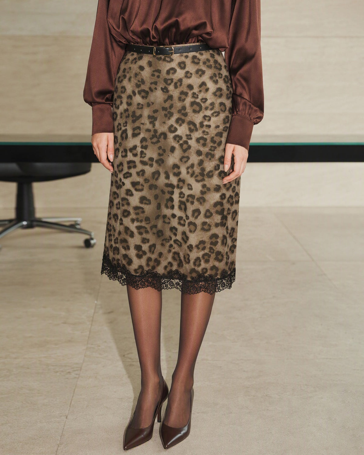 Brown animal-print midi skirt with black scalloped lace hem